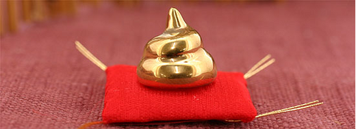 Золотая какашка - брелок для сотового телефона из Японии